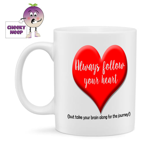 10oz white gloss ceramic mug with a picture of a large red heart. Over the heart in white text is written "Always follow your heart" below the picture in a smaller black text is the words "(but take your brain along for the journey)"