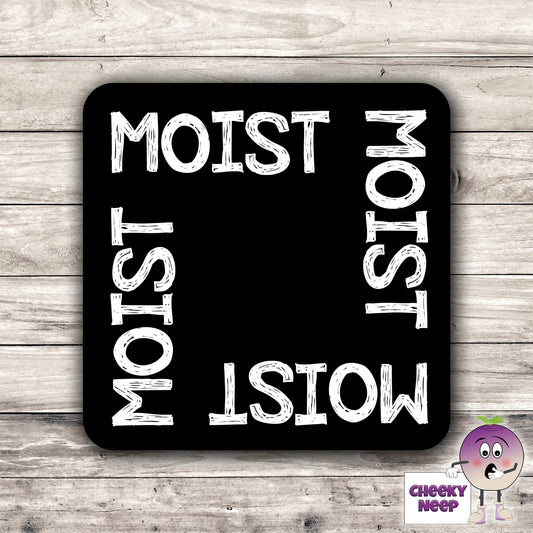 Square black hardboard coaster with the words "Moist" printed four times around the outside of the coaster. As produced by CheekyNeep.com