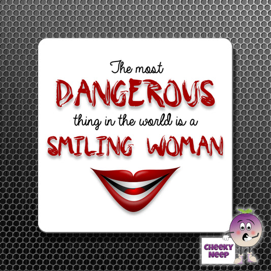 square fridge magnet with the words "The most dangerous thing in the world is a smiling woman" printed.