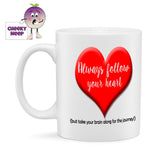 10oz white gloss ceramic mug with a picture of a large red heart. Over the heart in white text is written "Always follow your heart" below the picture in a smaller black text is the words "(but take your brain along for the journey)" 