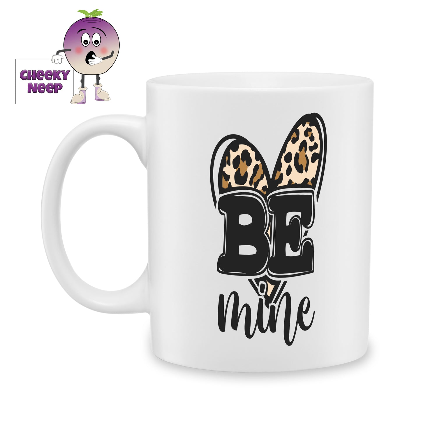 White ceramic mug with a heart coloured in a leopard print with the words "Be Mine" printed over the heart as produced by Cheekyneep.com