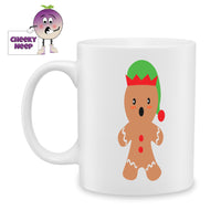 White ceramic mug with a picture of a gingerbread man in an elf hat printed on the mug as produced by Cheekyneep.com