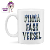 10oz ceramic white gloss mug with the words "Dinna Fash Yersel" written in bold blue tartan.