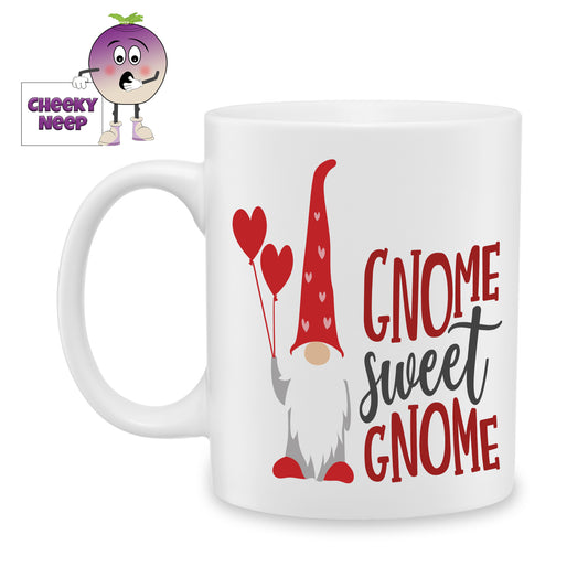 White ceramic mug with a picture of Gnome holding two red balloons in the shape of love hearts and the words "Gnome Sweet Gnome" printed on the mug as produced by Cheekyneep.com