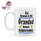 10oz white ceramic mug with the slogan "DAD knows a lot GRANDAD knows everything" printed on the mug with a couple of gold stars