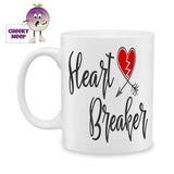 white ceramic mug with the words "Heart Breaker" and a picture of a red heart that has been torn in two as produced by Cheekyneep.com