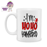 10oz ceramic mug with the text "I'm ho ho hammered" printed in black text