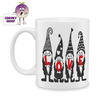 white ceramic mug with a picture of gnomes holding the word 