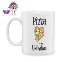 white ceramic mug with the picture of a pizza in the shape of a heart together with the words 