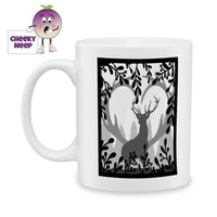 White ceramic mug with the silhouette of a reindeer in some trees printed on the mug. Mug as produced by Cheekyneep.com