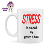 White ceramic mug with the word STRESS in large red text and the rest of the slogan "is caused by giving a fuck" in black text. As supplied by Cheekyneep.com