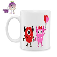 white ceramic mug with a picture of two monsters next to each other with one holding two heart shaped balloons. Mug as produced by Cheekyneep.com