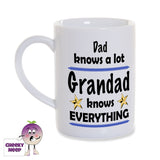 8oz white gloss porcelain mug with the slogan "Dad knows a lot. Grandad knows EVERYTHING" and two gold stars printed on the mug
