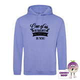 True violet hoodie with the slogan One of us is right and the other one is you printed on the front of the hoodie