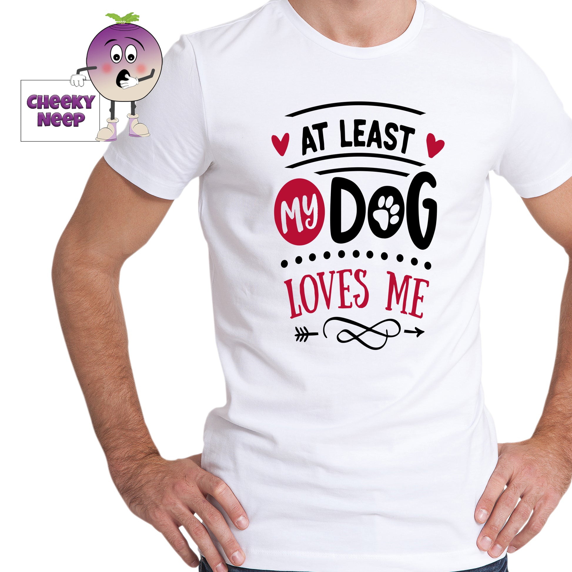 Man wearing a white tee with the slogan "At least my dog loves me" printed on the tee. Tee as produced by Cheekyneep.com