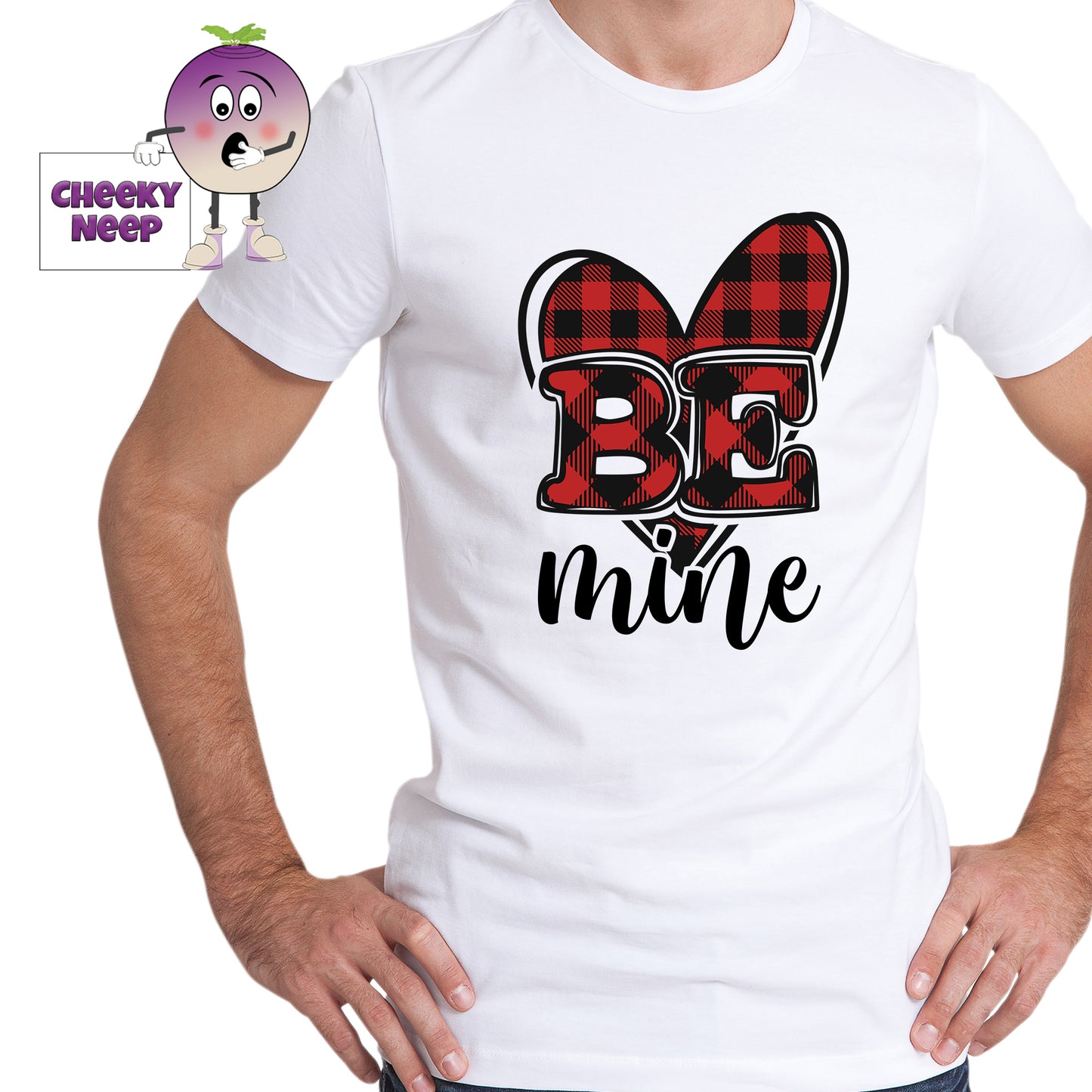 Man in a white tee with the slogan "Be Mine" printed in front of a red check print heart shape on the tee. Tee as produced by Cheekyneep.com