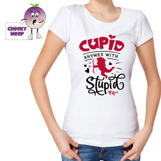 Woman in a white tee with the slogan "Cupid Rhymes With Stupid" printed on the tee in black and red. Tee as produced by Cheekyneep.com