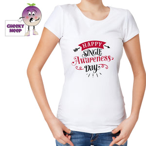 Woman in a white tee with the slogan "Happy Single Awareness Day" printed on the tee in black and red. Tee as produced by Cheekyneep.com