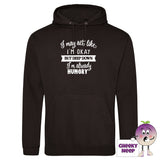 Black hoodie with slogan "I may act like I'm okay but deep down I'm already hungry"
