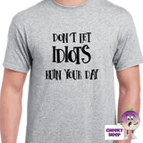 Mens sports grey t-shirt with the slogan "Don't Let Idiots Ruin Your Day" printed on the front of the tee as produced by Cheekyneep.com