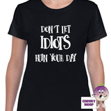 Womens black t-shirt with the slogan "Don't Let Idiots Ruin Your Day" printed on the front of the tee as produced by Cheekyneep.com