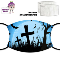 Nighttime picture of a graveyard with the moon in the background and bats and crosses in the foreground printed on a face cover together with a picture of two carbon filters as supplied by CheekyNeep.com