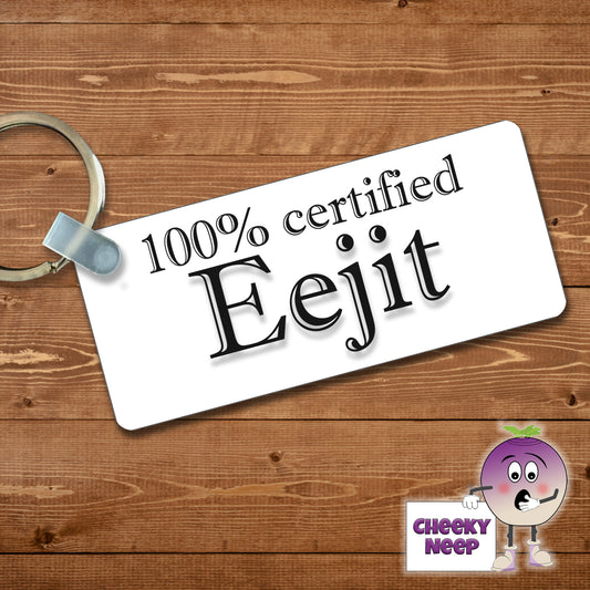 Rectangular plastic keyring with the words "100% certified Eejit" printed on both sides.