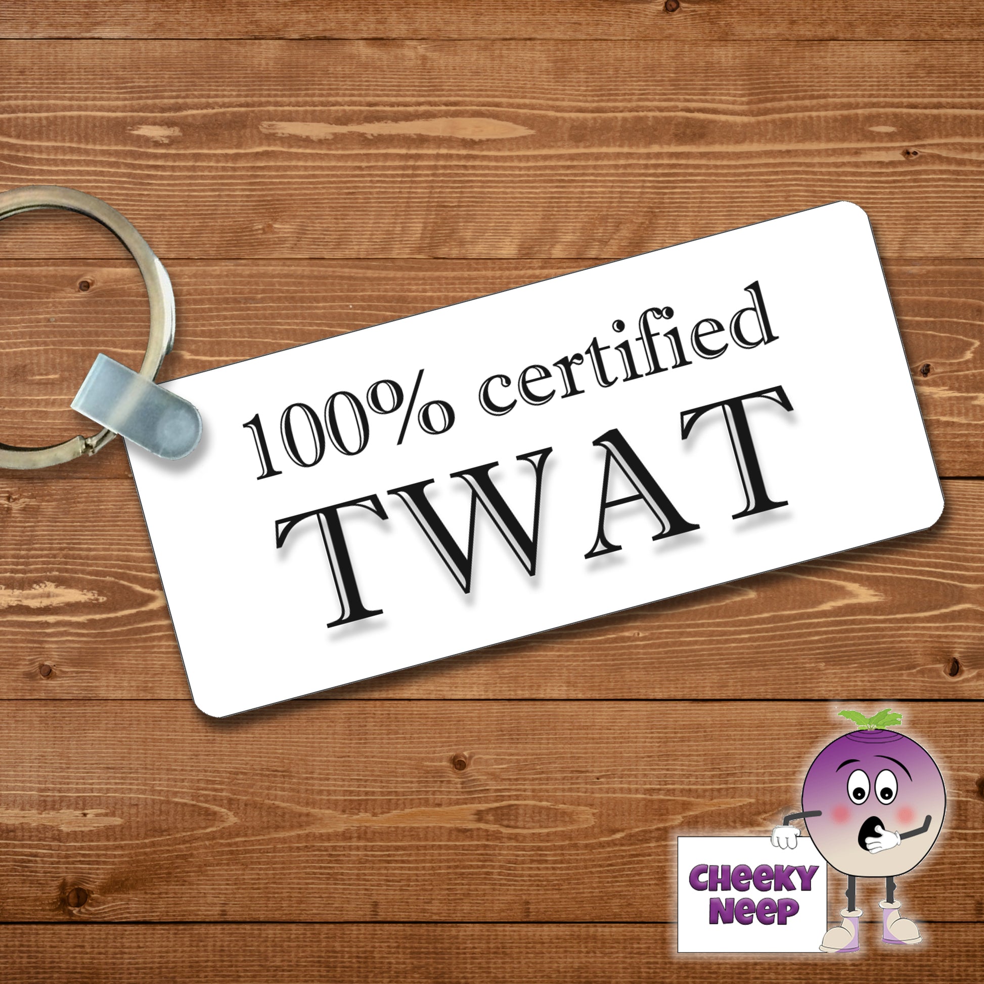 Rectangular plastic keyring with the words "100% certified Twat" printed on both sides.