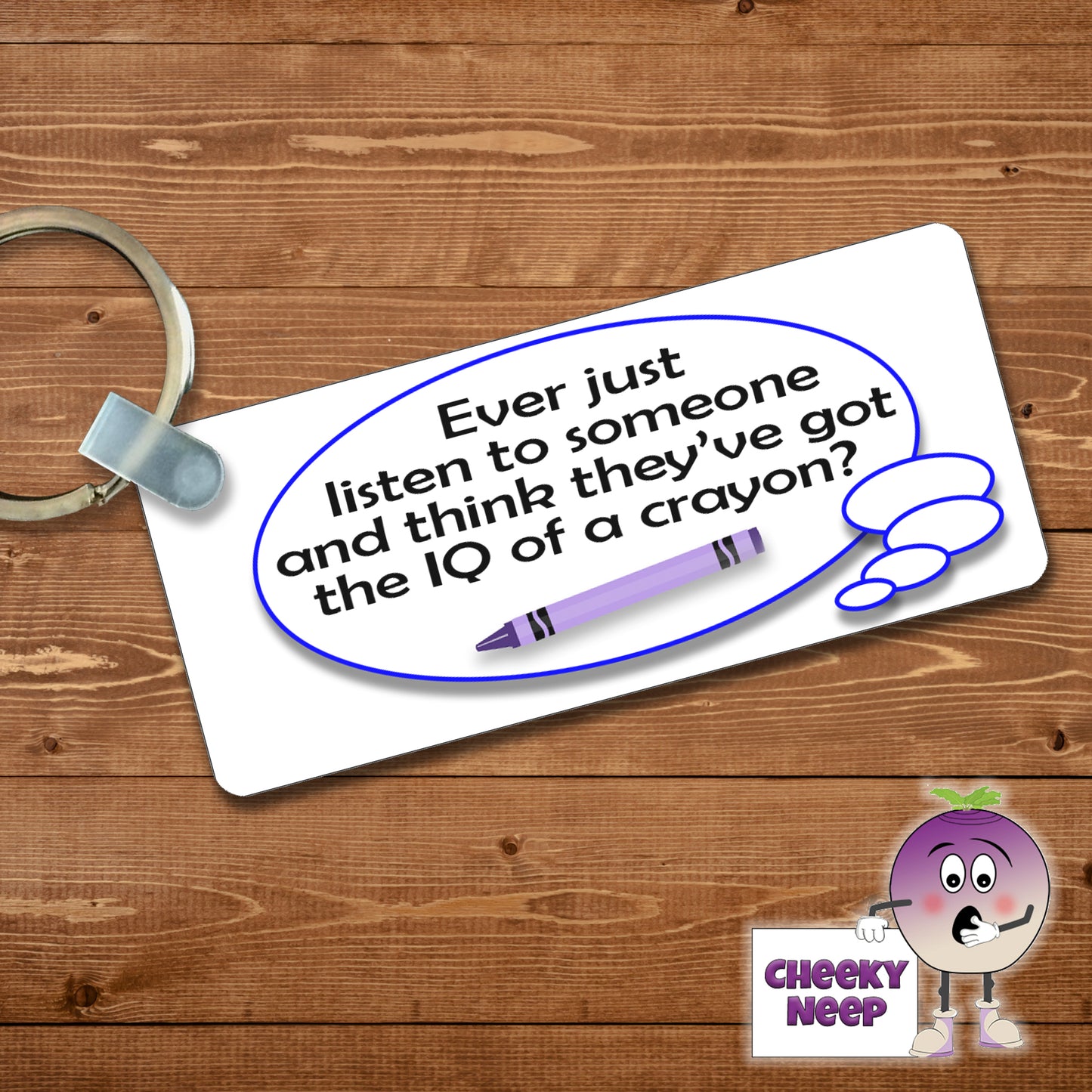 Rectangular plastic keyring with the words "Ever just listen to someone and think they've got the IQ of a crayon" printed on both sides.