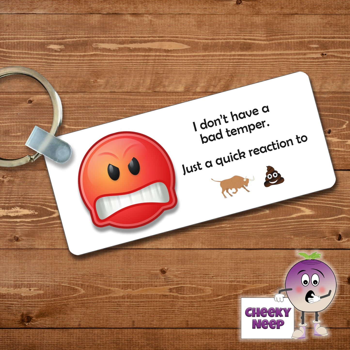 Rectangular plastic keyring with the words "I don't have a bad temper" printed above a picture of a red angry emoji. The words "Just a quick reaction" is printed below the picture and below the text is a small picture of a bull and the poop emoji. The keyring is printed on both sides.