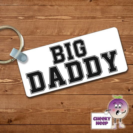 Rectangular plastic keyring with the words "Big Daddy" printed on both sides.