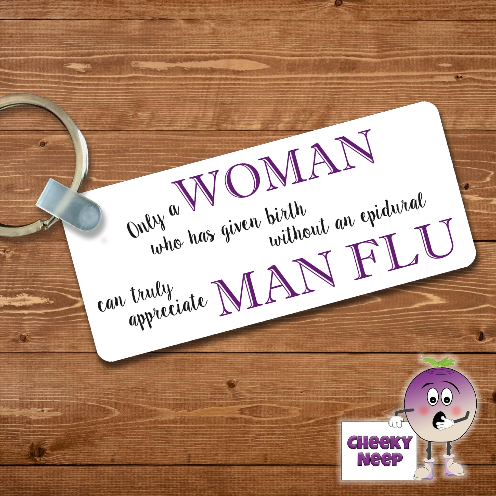 Rectangular plastic keyring with the words "Only a WOMAN who has given birth without an epidural can truly appreciate MAN FLU" printed on both sides.