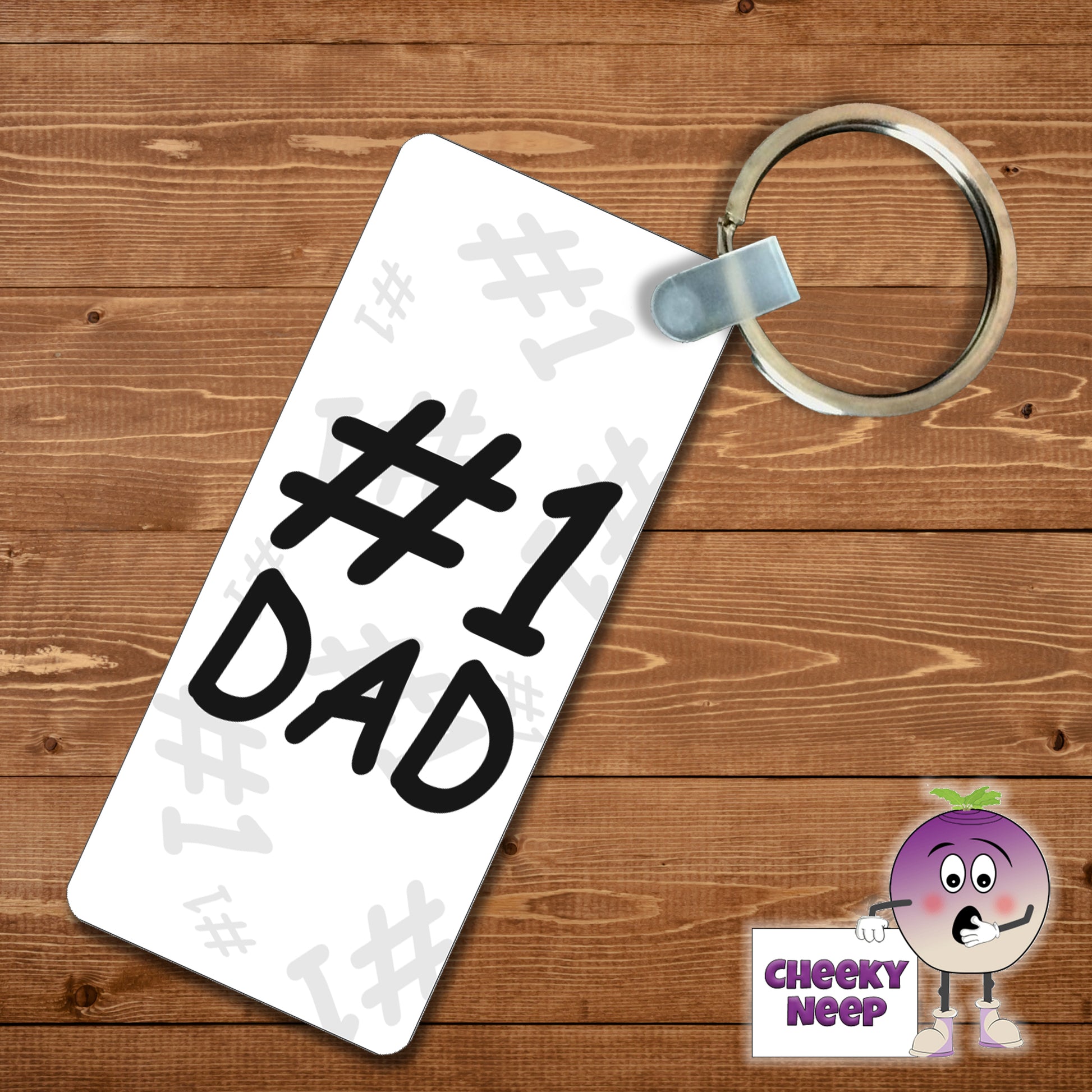 Rectangular plastic keyring with the words "#1 Dad" printed on both sides.