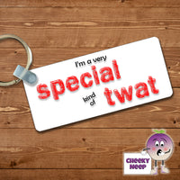 Rectangular plastic keyring with the words 