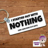Rectangular plastic keyring with the words "I started with nothing (and I have most of it left)" printed on both sides.