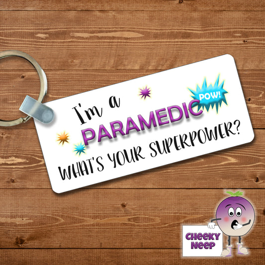 Rectangular plastic keyring with the words "I'm a PARAMEDIC what's your SUPERPOWER?" printed on both sides.