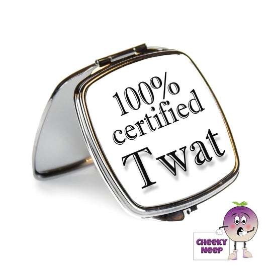 Square steel compact mirror with the words "100% certified Twat" printed on the front of the mirror.