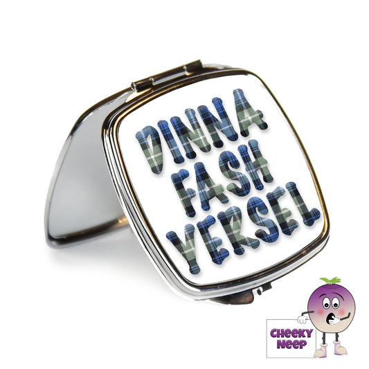 Square steel compact mirror with the words "Dinna Fash Yersel" printed on the front of the mirror.