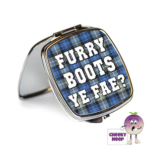 Square steel compact mirror with the words "Furry Boots Ye Fae?" printed on the front of the mirror.
