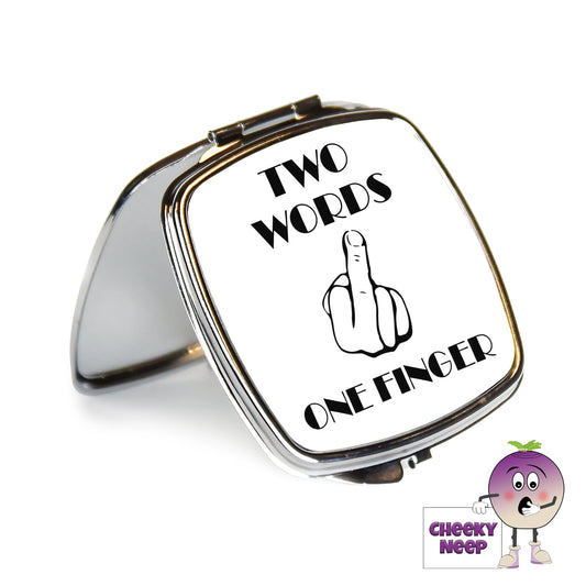 Square steel compact mirror with the words "Two Words One Finger" printed on the front of the mirror.