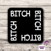 Square black hardboard coaster with the words 