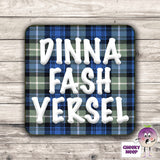 Square hardbacked coaster with the words "Dinna Fash Yersel" printed on it.