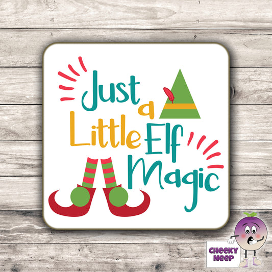 Drinks coaster with the words "Just A Little Elf Magic" printed on the coaster as produced by Cheekyneep.com