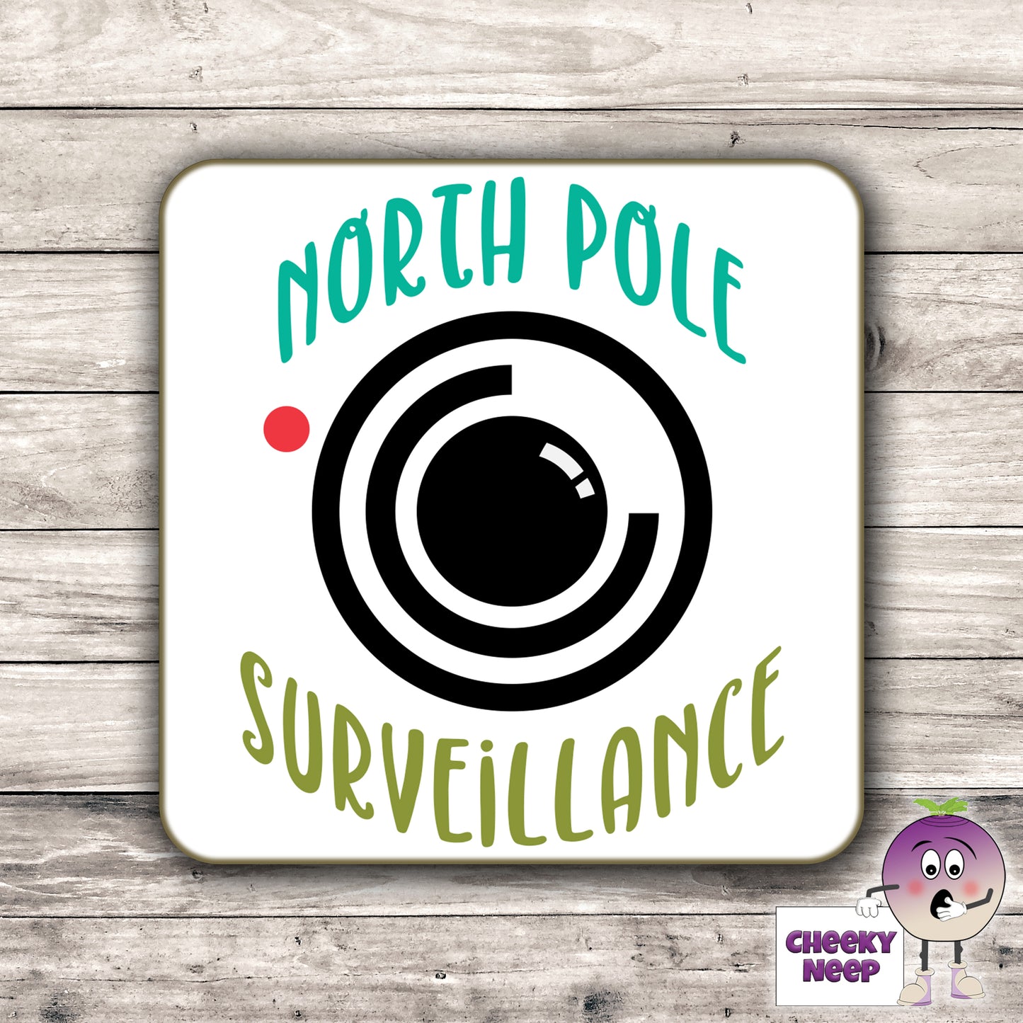 Drinks coaster with the words "North Pole Surveillance" printed on the coaster as produced by Cheekyneep.com