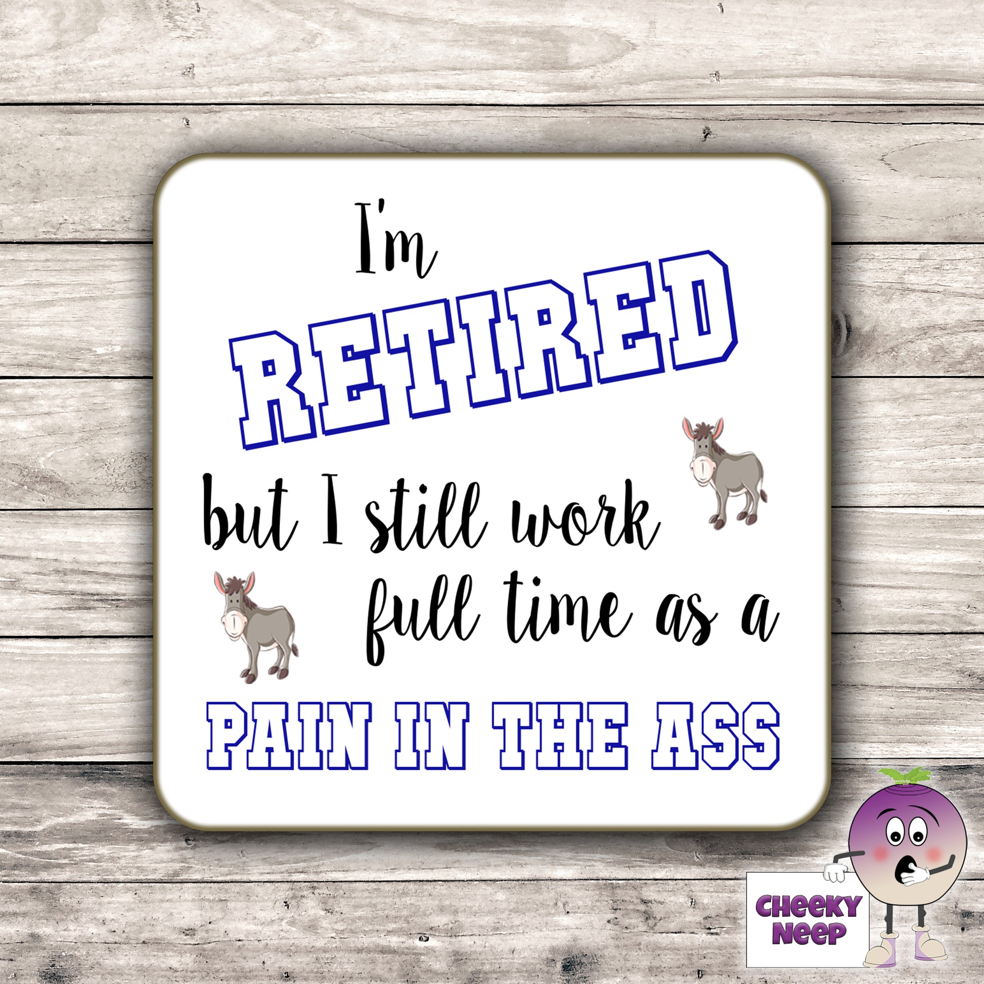 Square hardbacked coaster with the words "I'm retired but still work full time as a pain in the ass" printed on it.