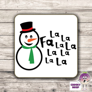 Drinks coaster with the words "Fa La La La La" printed beside a snowman on the coaster as produced by Cheekyneep.com