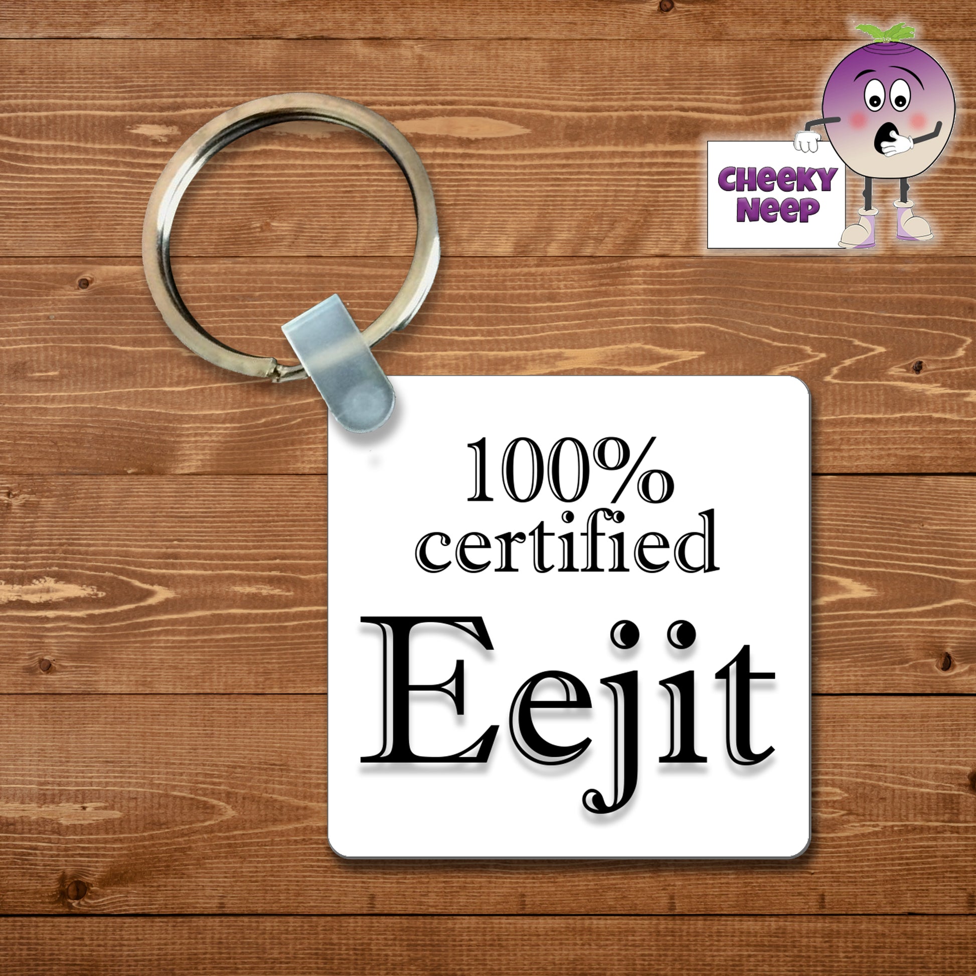 Square plastic keyring with the words "100% Eejit" printed on both sides.