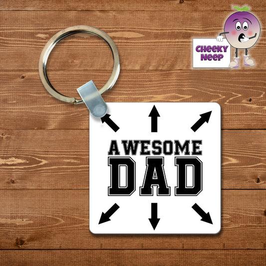 Square plastic keyring with the words "Awesome Dad" printed on both sides.