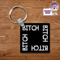 Black square keyring with the words 