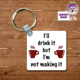 Square plastic keyring with the words "I'll drink it but I'm not making it" printed on both sides.